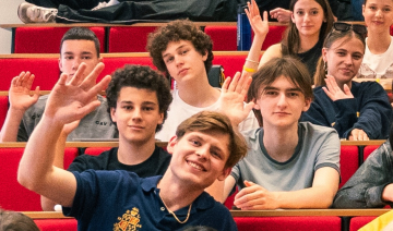 Nikita Piazenko with a team of international students enjoying their first British summer school at the prestigious David Game College in London