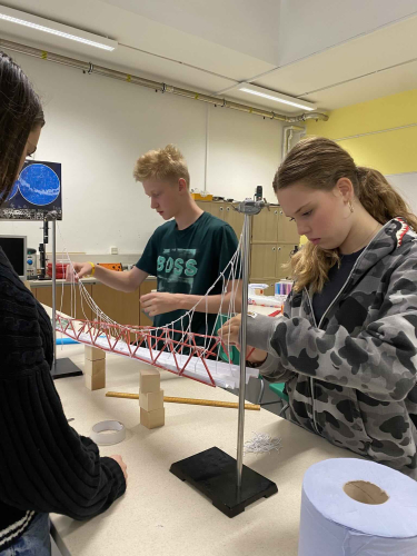 A group of students designing a bridge in Engineering. Academic Summer Career Pathways age 14-17