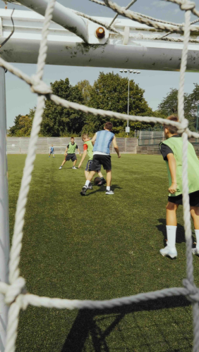Looking through the goal to the football pitch. Summer Football Camp at Sidcot School for children age 8+